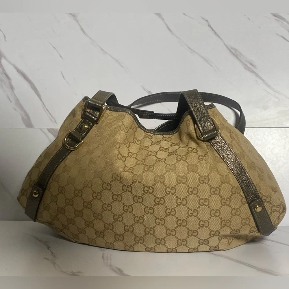Authentic Gucci GG Tan Canvas Pelham Shoulder Bag. - Picture 1 of 7